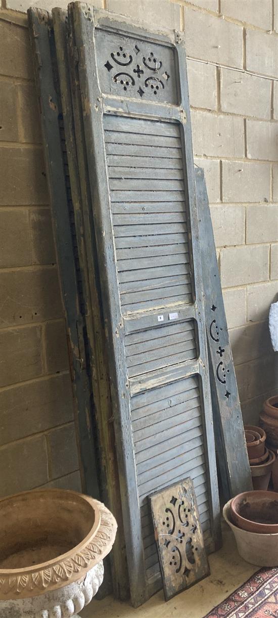 A set of four 19th century French blue painted three panel shutters, 54 x 230cm